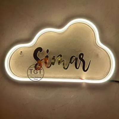 This cloud-shaped neon sign features the name "Simar" in a mirrored gold finish. The warm white light creates a soft, dreamy glow.
