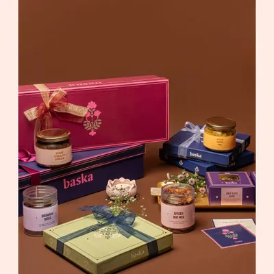 A full festive hamper arrangement for a Rakshabandhan campaign, featuring a variety of gift boxes, jars, and sweets. I style these shots to look abundant and celebratory, perfect for seasonal marketing.