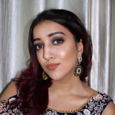 A classic black smokey eye is timeless. This look is all about elevating the eyes with a touch of mystery and drama, perfect for a cocktail party or reception.