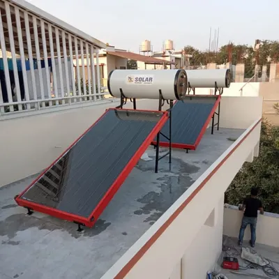 This rooftop installation features two of our FPC solar water heating systems with custom red frames. We can provide different colour options for the collector panels to suit your property's design.