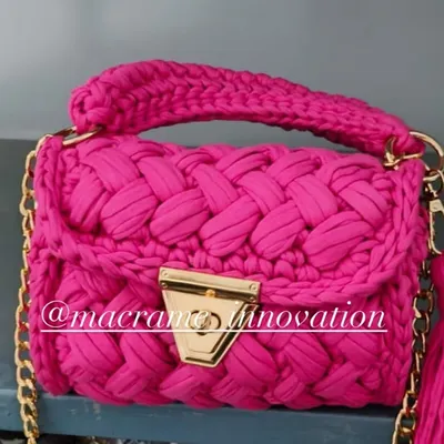 This hot pink crochet puff bag is for those who love to make a statement. The color is so vibrant and the chunky texture is just irresistible.