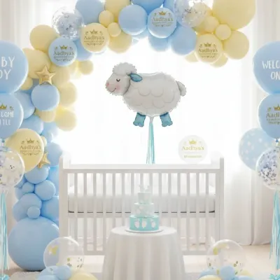 For a soft and sweet celebration, we designed this lamb-themed baby shower decor. The setup includes a gentle pastel balloon arch in blue and yellow framing the baby's crib, with a large sheep foil balloon as the centerpiece. This clean and elegant design is perfect for a godh bharai or a welcome home event.