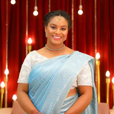 It was a joy to get this lovely guest ready for an Indian wedding. I created a soft, elegant look with a braided hairstyle that complemented her beautiful light blue saree.
