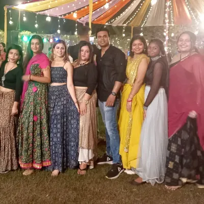 A photo with our amazing students after a successful sangeet night performance. Seeing the joy and confidence on their faces is the best reward for us as choreographers.