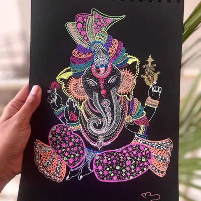 A vibrant and detailed doodle of Lord Ganesha, created with neon gel pens on black paper. May he bless your home with peace, prosperity, and happiness.