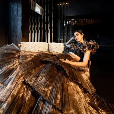 A dramatic, high-fashion look for a magazine cover shoot with actress Ritu Varma. I styled her in this incredible tiered metallic gown, creating a powerful and glamorous editorial image.