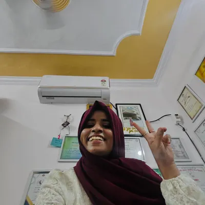 A happy selfie in my studio with my new AC. I believe in investing in yourself and your workspace. The certificates on the wall are a testament to my dedication.