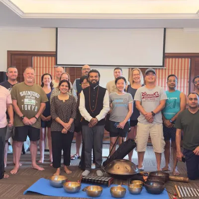 A group photo after a holistic wellness workshop for senior managers and expats. It's a privilege to bring these ancient practices into the corporate world to support leadership and well-being.