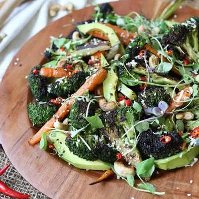 My grilled broccoli, carrot, and avocado salad is a perfect example of a gluten-free and vegan meal. It's packed with fresh vegetables, creamy avocado, and a flavourful dressing, making it a refreshing and satisfying option.