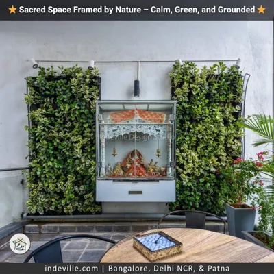 For this home, I created a sacred pooja corner that feels alive. The modern glass mandir is framed by two lush vertical gardens, creating a serene and grounded space for daily reflection and prayer.