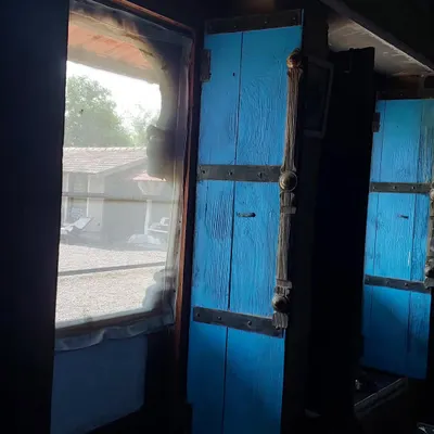I love the details of the places we stay, like these old, bright blue wooden shutters. It’s this rustic charm that makes the environment feel so grounded and peaceful. Mentally, I'm often here.