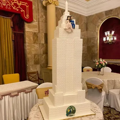 There's always a beautiful story behind a wedding cake. For this one, the couple wanted a replica of the Empire State Building, and we were so happy to create this towering, detailed structure for their special day. I can only imagine their love story started there!