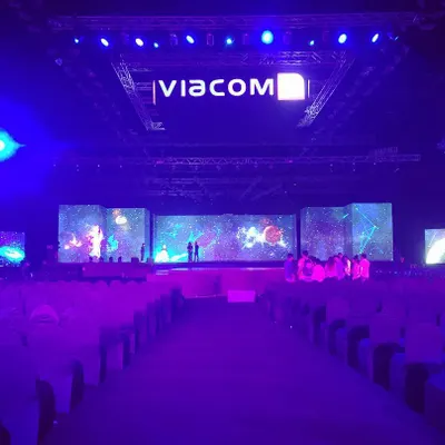 For Viacom's 10th-anniversary event, I designed this massive stage setup inside the NSCI Dome. The highlight was a 180-degree wrap-around LED screen that created a fully immersive visual experience for over 3500 attendees, showcasing my capability for large-scale corporate event production.