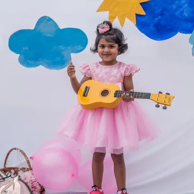 A perfect party look for a little rockstar. This pink tulle dress is designed for maximum fun, with a full, twirl-worthy skirt and a comfortable top that lets her play and celebrate with ease.