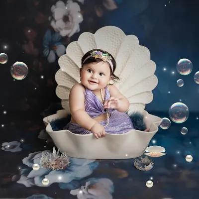A magical little mermaid found in a seashell. I love bringing fantasy themes to life, and this underwater-inspired setup with pearls and bubbles is absolutely dreamy.