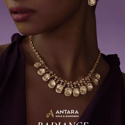 This elegant necklace showcases the refined radiance of Polki. I arranged oval and teardrop Polki diamonds in delicate halo settings to create a soft, heritage glow along the neckline, perfect for any celebration.