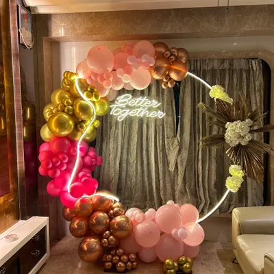 We can transform any corner of your home with a stunning balloon ring. This one, with a 'Better Together' neon sign, is perfect for anniversaries, engagements, or any celebration of love.