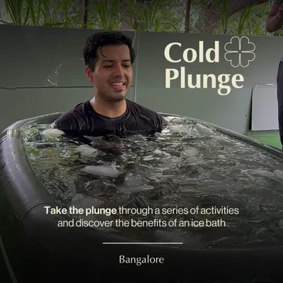 A participant embraces the challenge of the cold plunge. Our guided ice bath sessions in Bangalore are a powerful way to discover the benefits of cold exposure for recovery and focus.