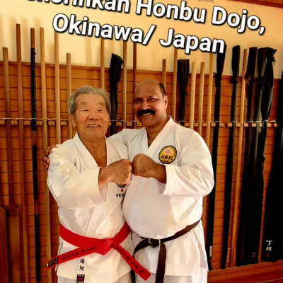 A cherished moment with my teacher at the Shorinkan Honbu Dojo in Okinawa. These personal interactions are where the true spirit and technique of the art are passed down.