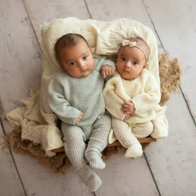 Photographing twins, especially when they are awake, presents a unique challenge. I will teach you the techniques to manage and capture beautiful, connected portraits of two babies at once.