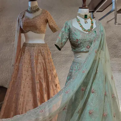 A glimpse of our traditional lehenga collection. This pastel peach and mint green lehenga are perfect for a daytime wedding or a sangeet, offering a fresh and elegant color palette.