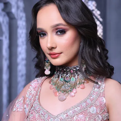 Elevating bridal beauty to new heights. This is the quality of work you will produce. This look features a dramatic smokey eye and soft waves, perfect for a modern, fashion-forward bride.