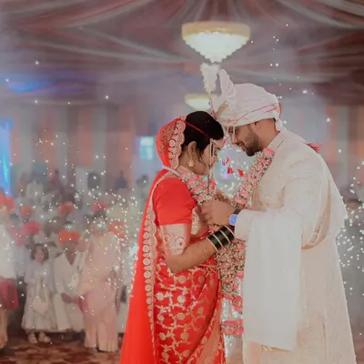 The Varmala ceremony is a highlight of any wedding. I captured this moment with sparklers in the background to enhance the magic and celebration of this Maharashtrian wedding.