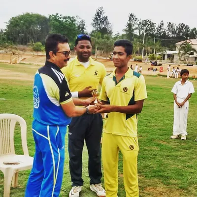 Another win for the academy. Here, one of our U-16 players is receiving a trophy after a key tournament performance. Our training prepares players for high-pressure finals, and I am proud to see them consistently bring home the silverware.