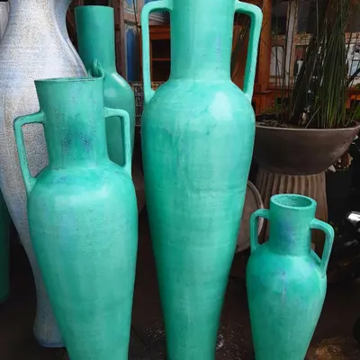 My 'Del Mar' vases, now available up to 7 feet tall. These are perfect for making a grand statement in entryways or large rooms.