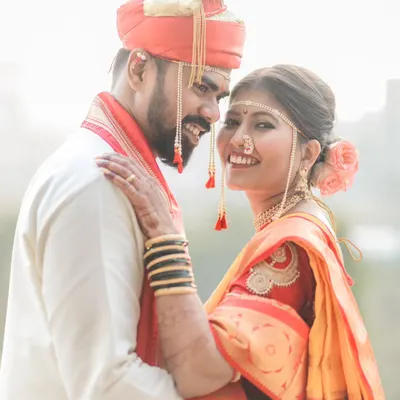 A joyful, candid portrait of Pratik and Madhuri. Her smile as he looks at her captures the real happiness of their wedding day. These are the unposed moments we strive to photograph.