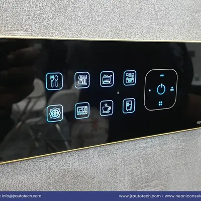 This is the centerpiece of a truly personalized smart home. Our premium JR XION touch panel, shown here with a custom gold frame and a wide array of icons, gives you granular control over every aspect of a room, from lighting scenes to appliances, all from one elegant interface.