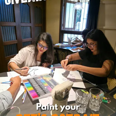Get your creative juices flowing at our 'Paint your Pet's Portrait' workshop. Here, participants are focused on sketching their furry friends before adding color.
