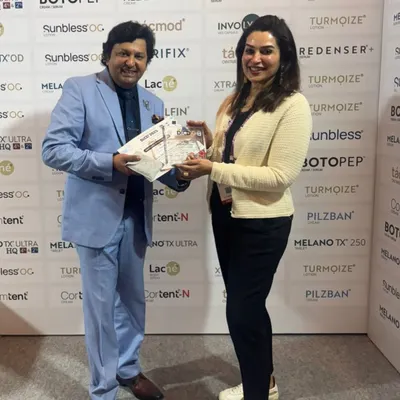 Receiving an award at a training event hosted by SAARCAAD. It is always an honor to be recognized by my peers and to contribute to the field of aesthetic dermatology.