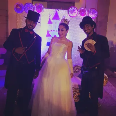 Throwback to a themed event where the classic magician look was the perfect fit. Here I am with my colleague and the host, ready for a magical evening.