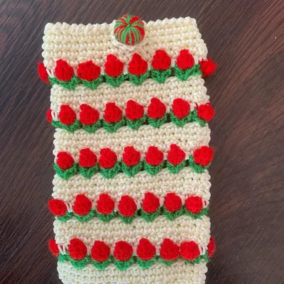 My new 3D tulip mobile pouch in a classic cream and red design. It's a stylish and hassle-free way to carry your phone while keeping it protected.