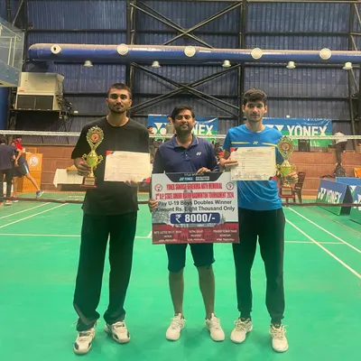 I stand with my winning trainees, Ujjwal Tomar and his partner, celebrating their double gold medal performance in Boy's Doubles and Mixed Doubles at the UP State Under 19 tournament in Prayagraj.
