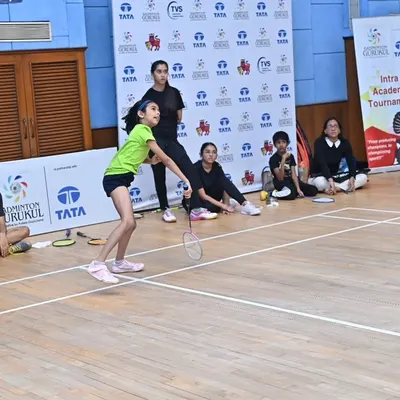 A young girl executes a forehand shot during our Intra-Academy Tournament at MCA, BKC. These internal tournaments provide crucial match practice in a supportive environment.
