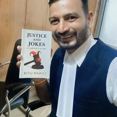 Proudly holding the first copy of "Justice and Jokes," a book by my sister and fellow advocate, Ritu Rawat. It's a wonderful look into the life of a lawyer.