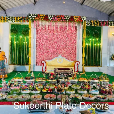 This was a grand 45-plate setup for a puberty ceremony. The extensive arrangement on the carpet creates a stunning visual impact, perfect for such an important milestone celebration.
