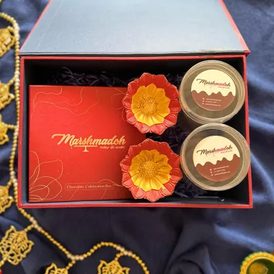 My Diwali gift hampers are designed to make the festival extra special. This box includes homemade, healthy, and guilt-free treats like diya-shaped chocolates and dessert jars.