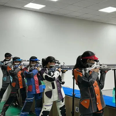 Our national-level rifle shooters in a group training session, creating a competitive and motivational environment to push their limits.