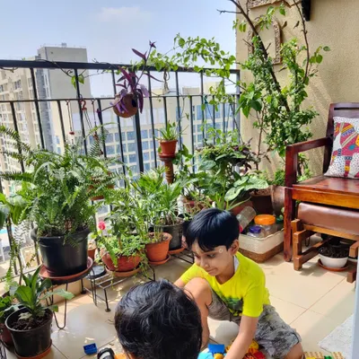 This is what a green sanctuary in the middle of the city looks like. I helped this family turn their balcony into a lush, safe, and beautiful play area where their children can connect with nature without leaving home. A balcony makeover like this focuses on durable, non-toxic plants.