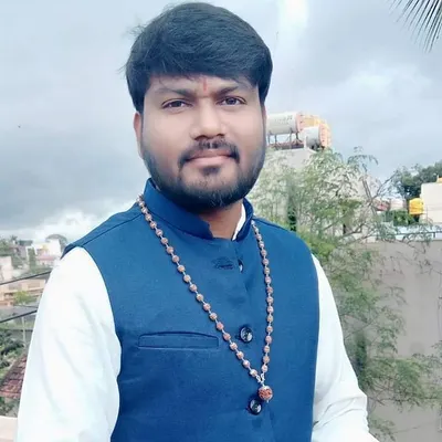 I am Dr. Vinay. My approach is based on a deep analysis of your horoscope to provide practical remedies that support your life's journey.