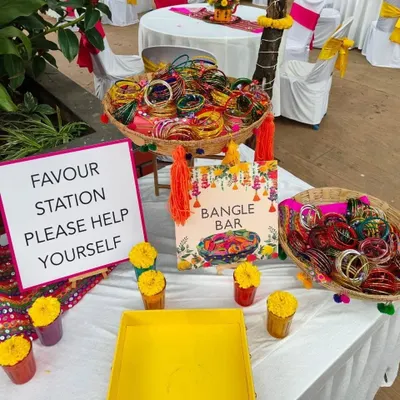 Our 'Bangle Bar' favor station is a fun and colorful addition to any Mehendi or Sangeet event. Guests are invited to help themselves and create their own set of bangles to wear and take home.