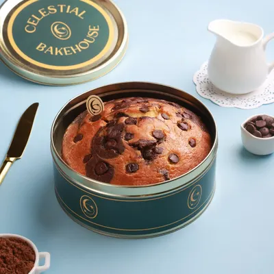 Our Marvel Marble Cake, a perfect swirl of vanilla and chocolate, presented in its travel-friendly tin. It's a simple pleasure, done right.