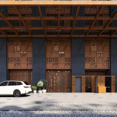 The entrance of The Ritz Carlton in New Delhi showcases our approach to contextual design. Intricate 'jaali' screens, traditionally used for ventilation and privacy, are reimagined as a key feature of the modern facade, creating a dramatic and culturally resonant first impression.