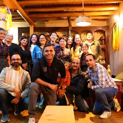 Our team enjoying a delicious and well-earned lunch at a local Ladakhi kitchen. Sharing meals together is a huge part of our community experience.