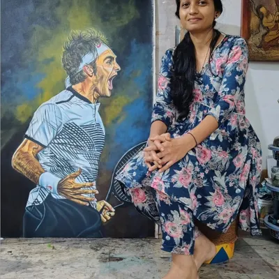 Here I am with the finished 4x2.5 ft Roger Federer canvas painting. It's always a proud moment to see the final result of many hours of work, especially when it captures such a powerful expression.
