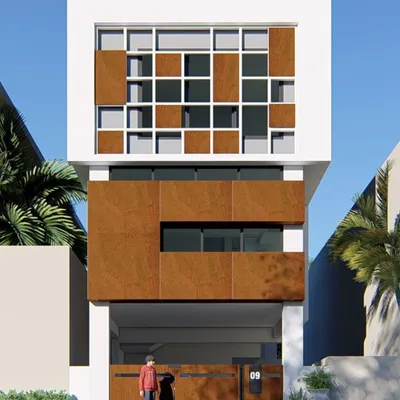 This 20x30 plot residence uses a corten steel facade and a stacked, zig-zag layout. This approach breaks the monotony of a narrow building and creates visually larger, more interesting spaces inside and out.
