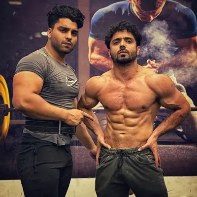 Posing with a client, showing the aesthetic look we are aiming for.